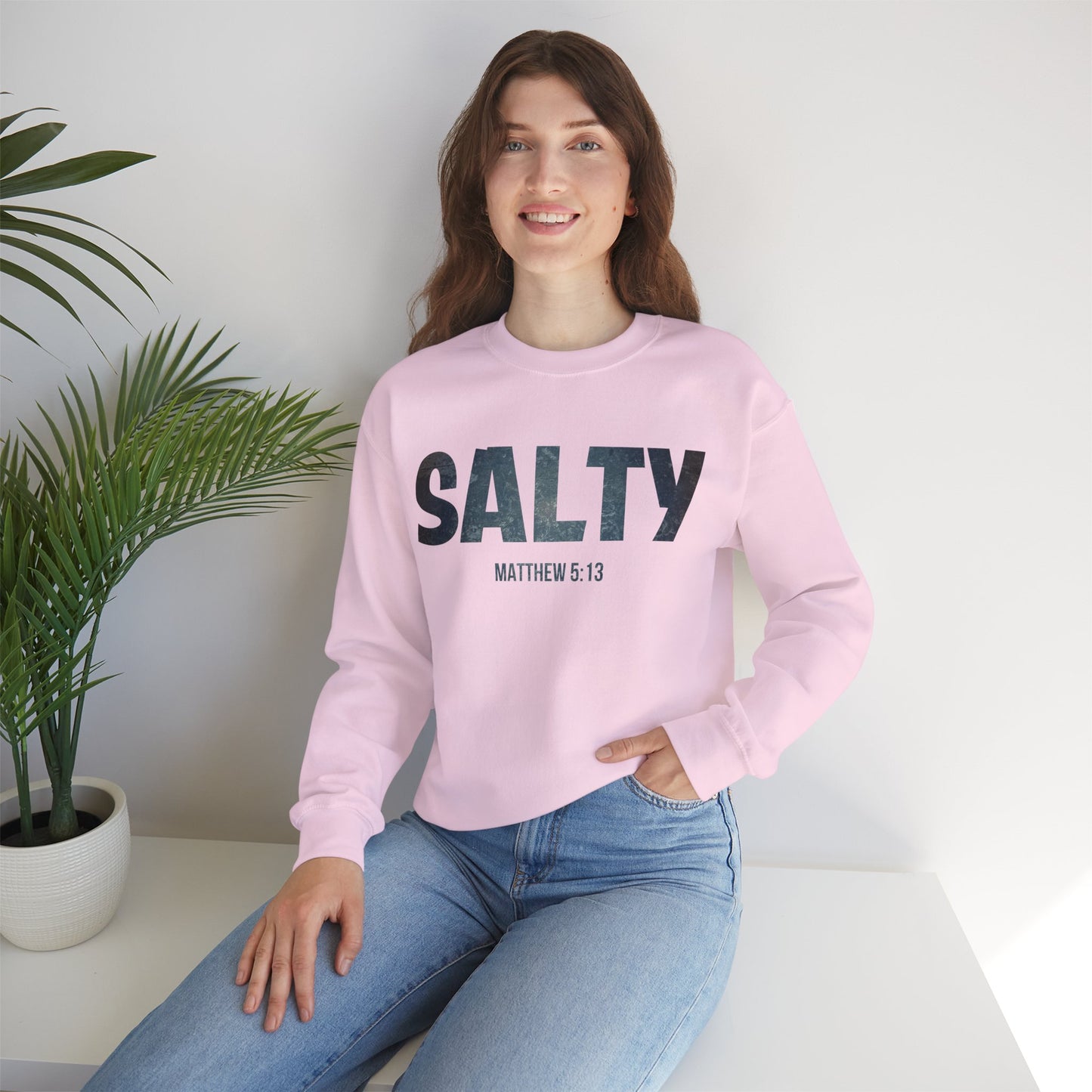 Stay SALTY Matthew 5:13 Unisex Sweatshirt S to 5XL by Faithful Living Home Front View in light pink Color lifestyle photo