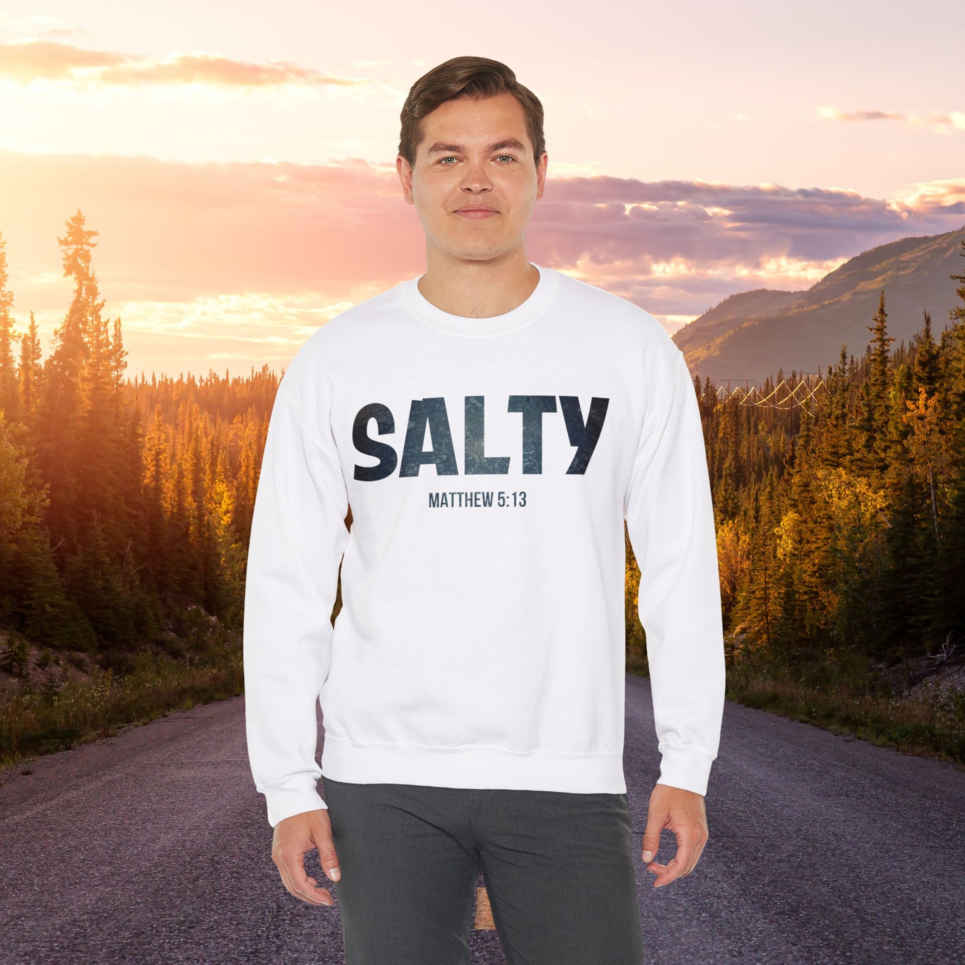 Stay SALTY Matthew 5:13 Unisex Sweatshirt S to 5XL by Faithful Living Home Front View worn by a man in White Color